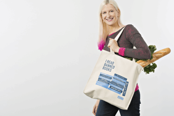 ACLU Model holding Banned Books Bag