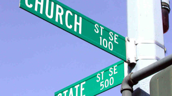 Street signs showing the corner of CHURCH and STATE