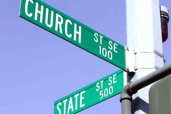 Street signs showing the corner of CHURCH and STATE