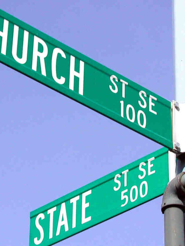 Street signs showing the corner of CHURCH and STATE