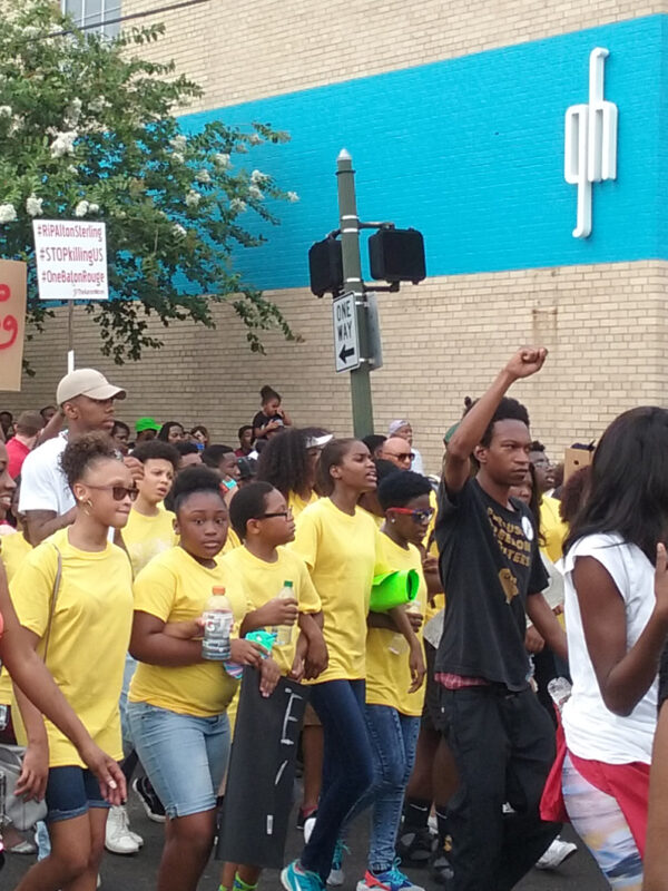 group of protesters marching in baton rouge, louisiana