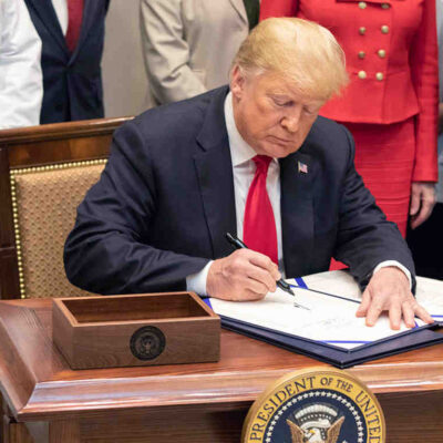 President Donald Trump signing an executive order
