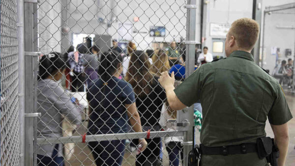 Image of immigrants in a detention facility