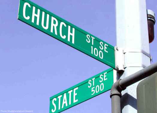 Street signs showing the corner of CHURCH and STATE 