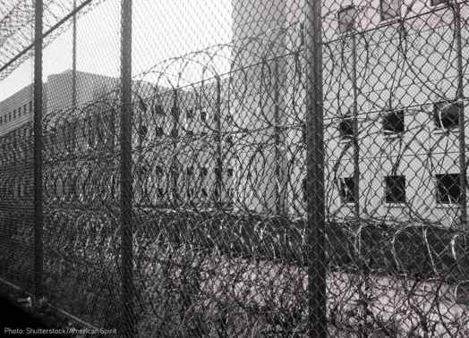 Razor wire and fence outside jail 