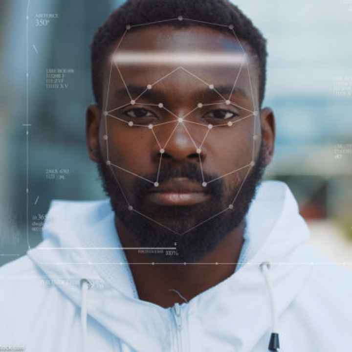 A black man being targeted with facial recognition technology