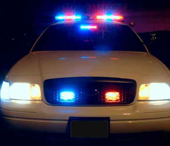 Police car with emergency lights on 